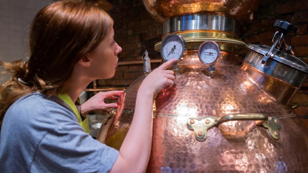 A woman distilling rose oil.